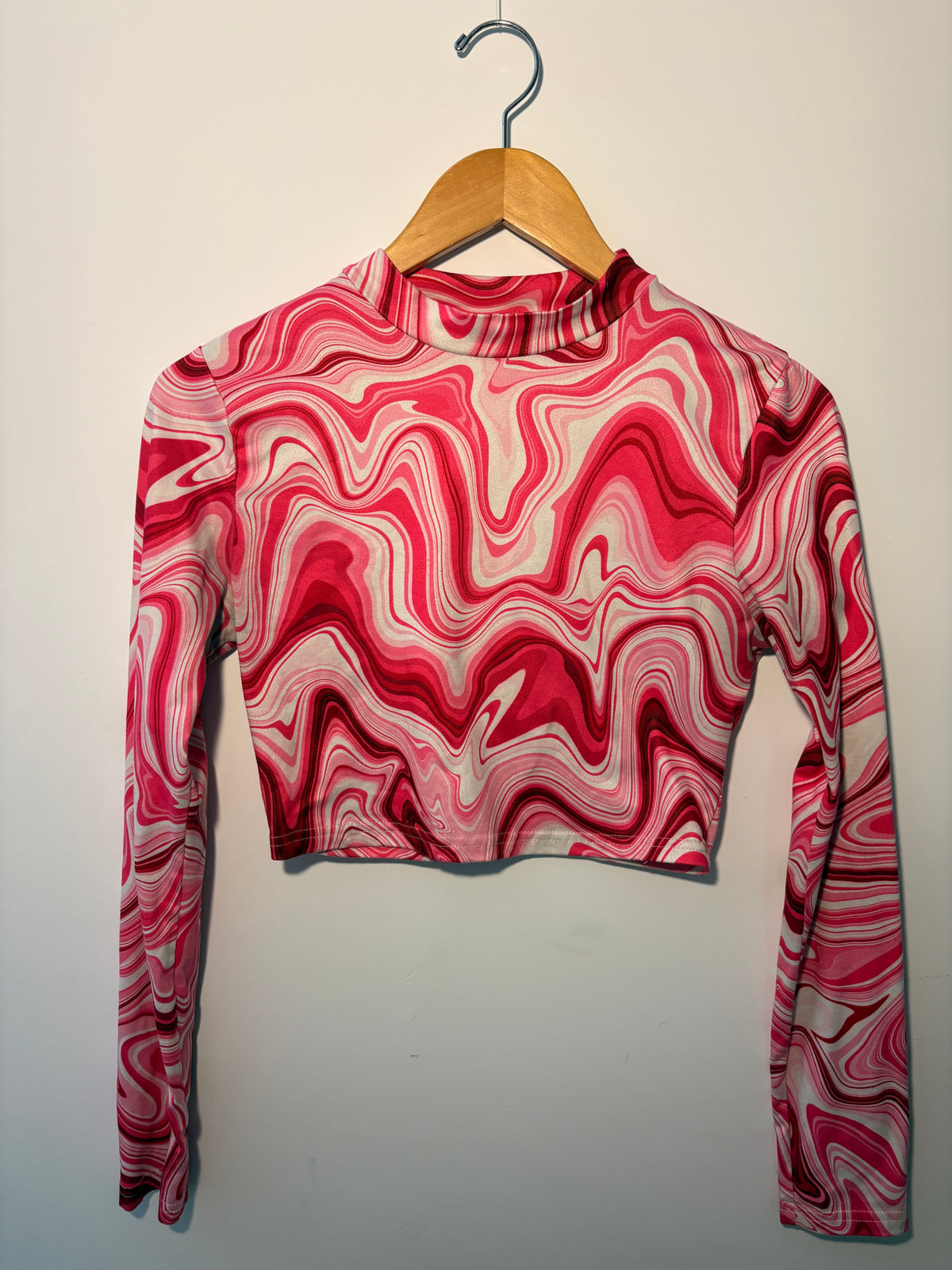 Pink and white long-sleeved sweater